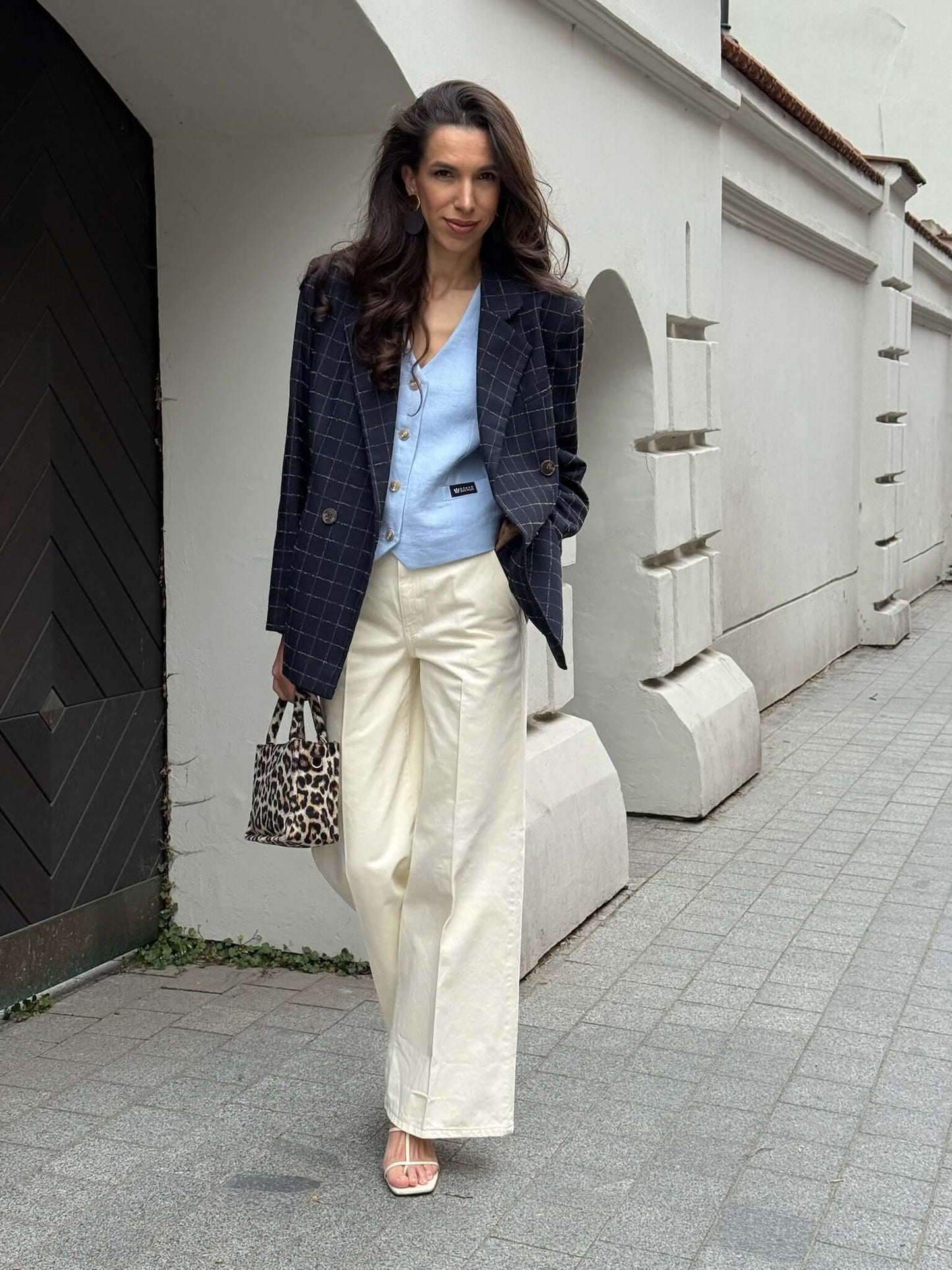 Baby blue women's linen waistcoat Vesta, city chic fashion look.