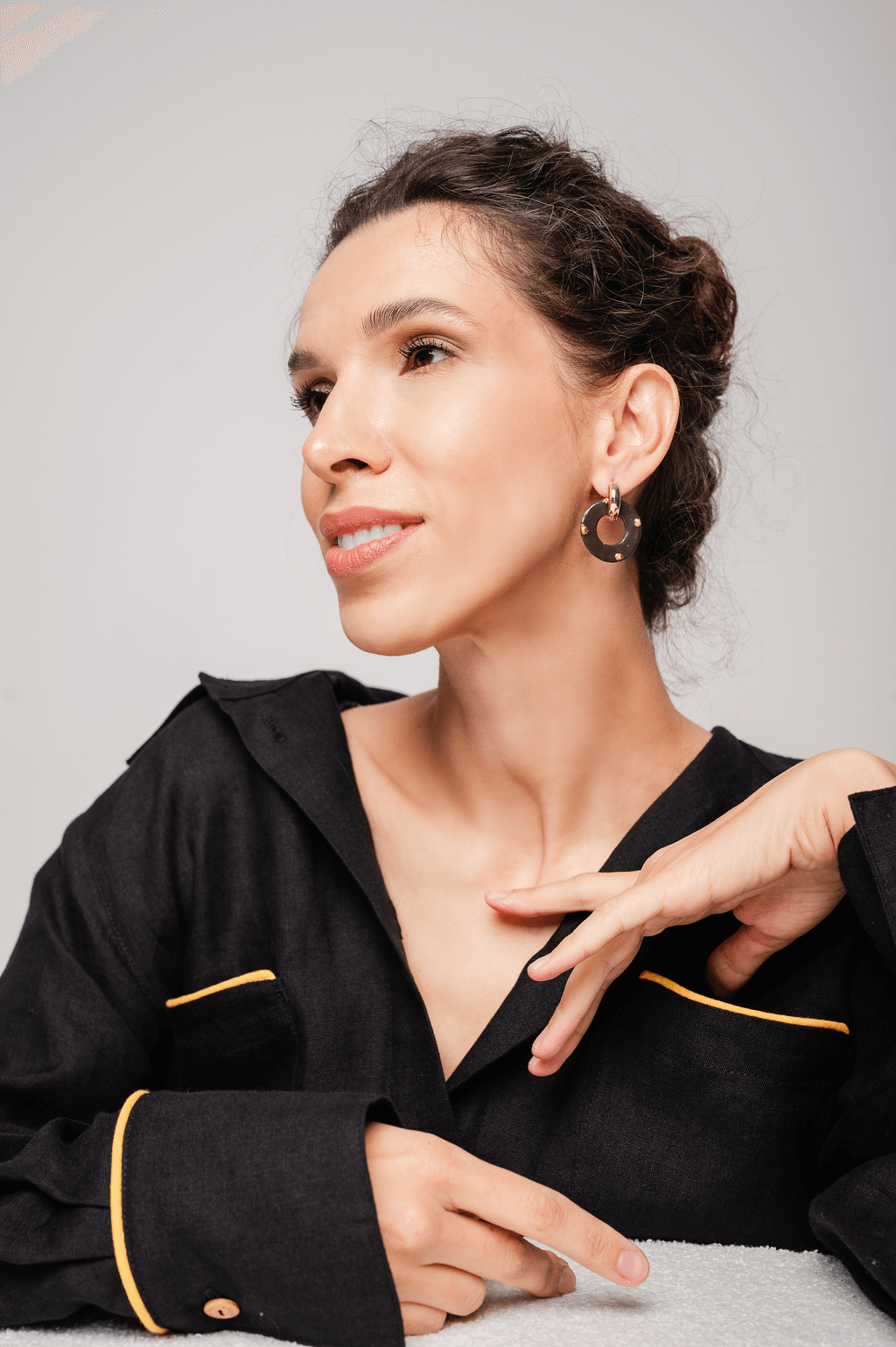 Close-up of Grand Duchess x Spark Flair earrings – handcrafted hoop-shaped porcelain earrings with 12K gold detailing