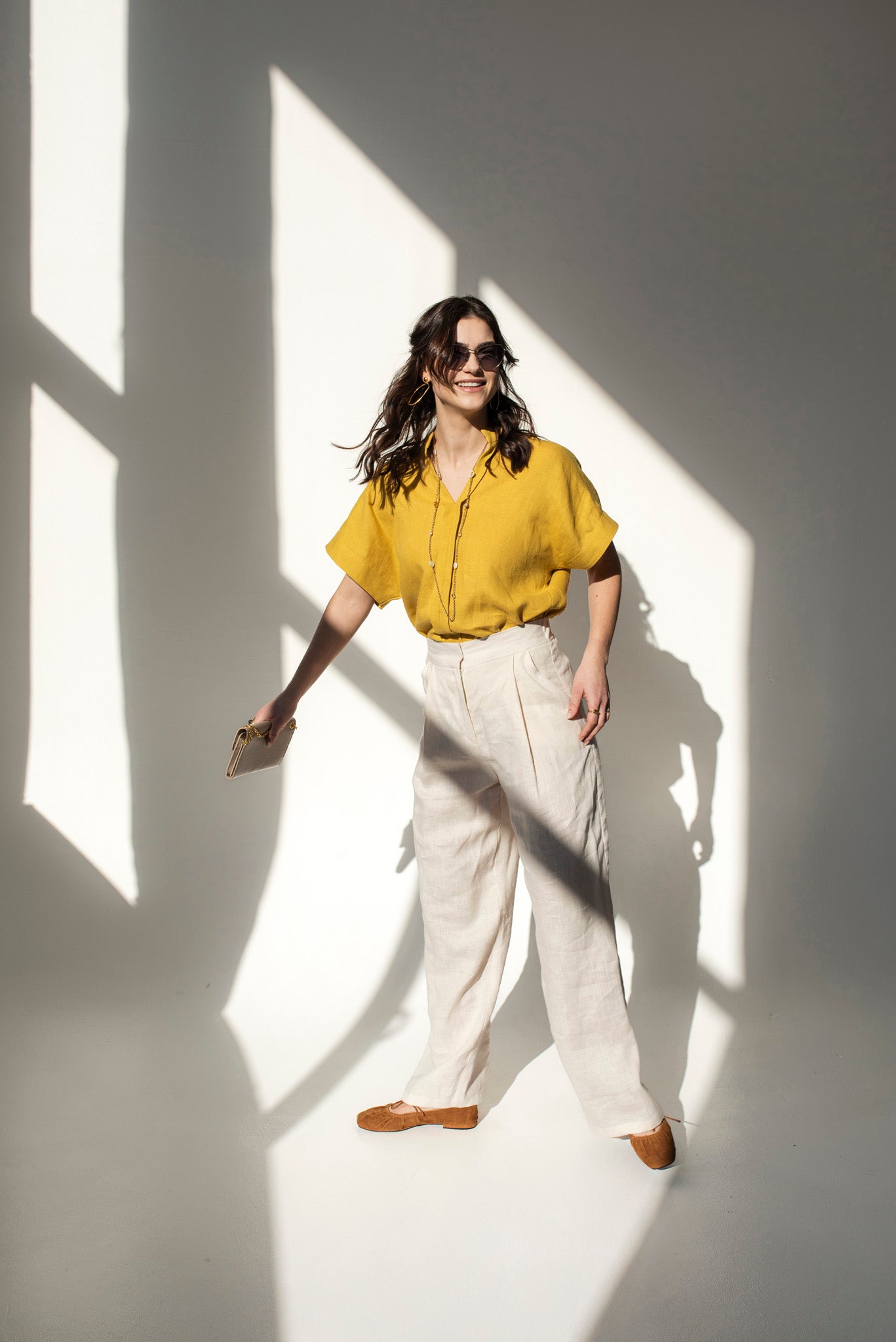 Mustard yellow Japanese style linen top for women with V-neck collar.