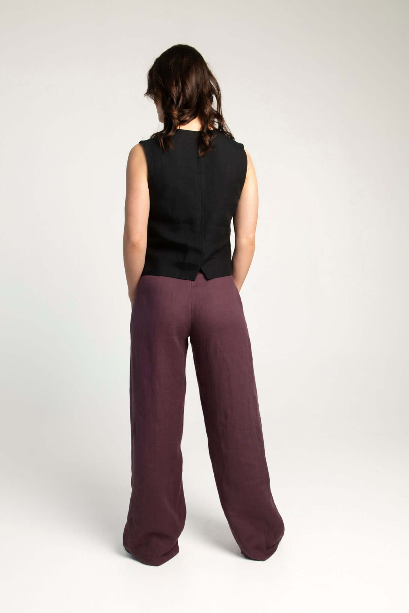 Sleeveless black women's linen waistcoat Vesta, back view