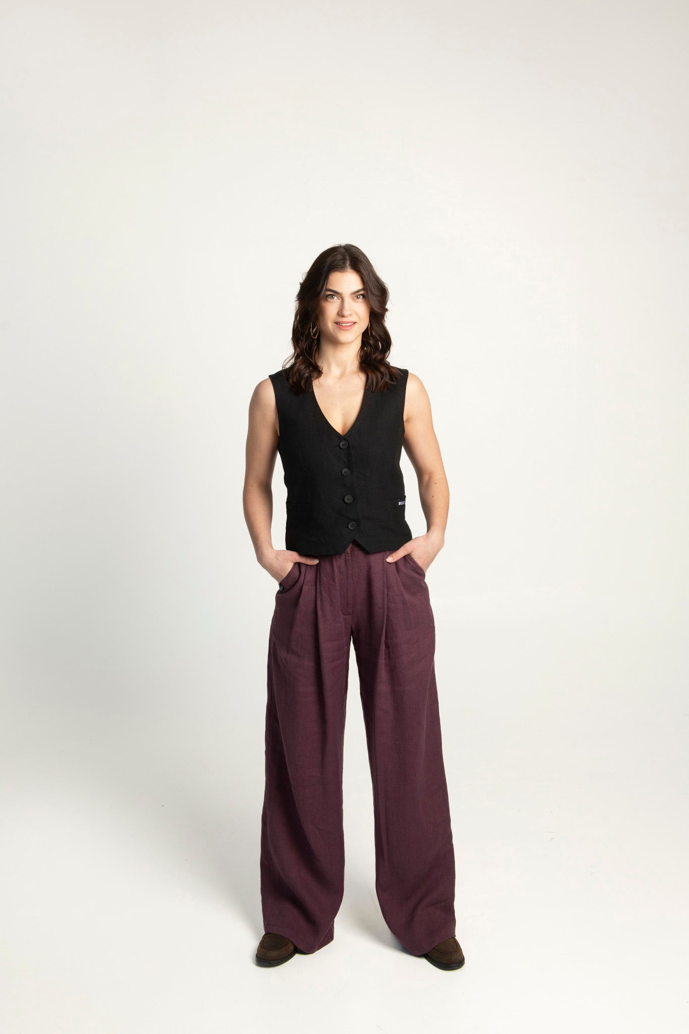 Wide-leg linen pants in burgundy.