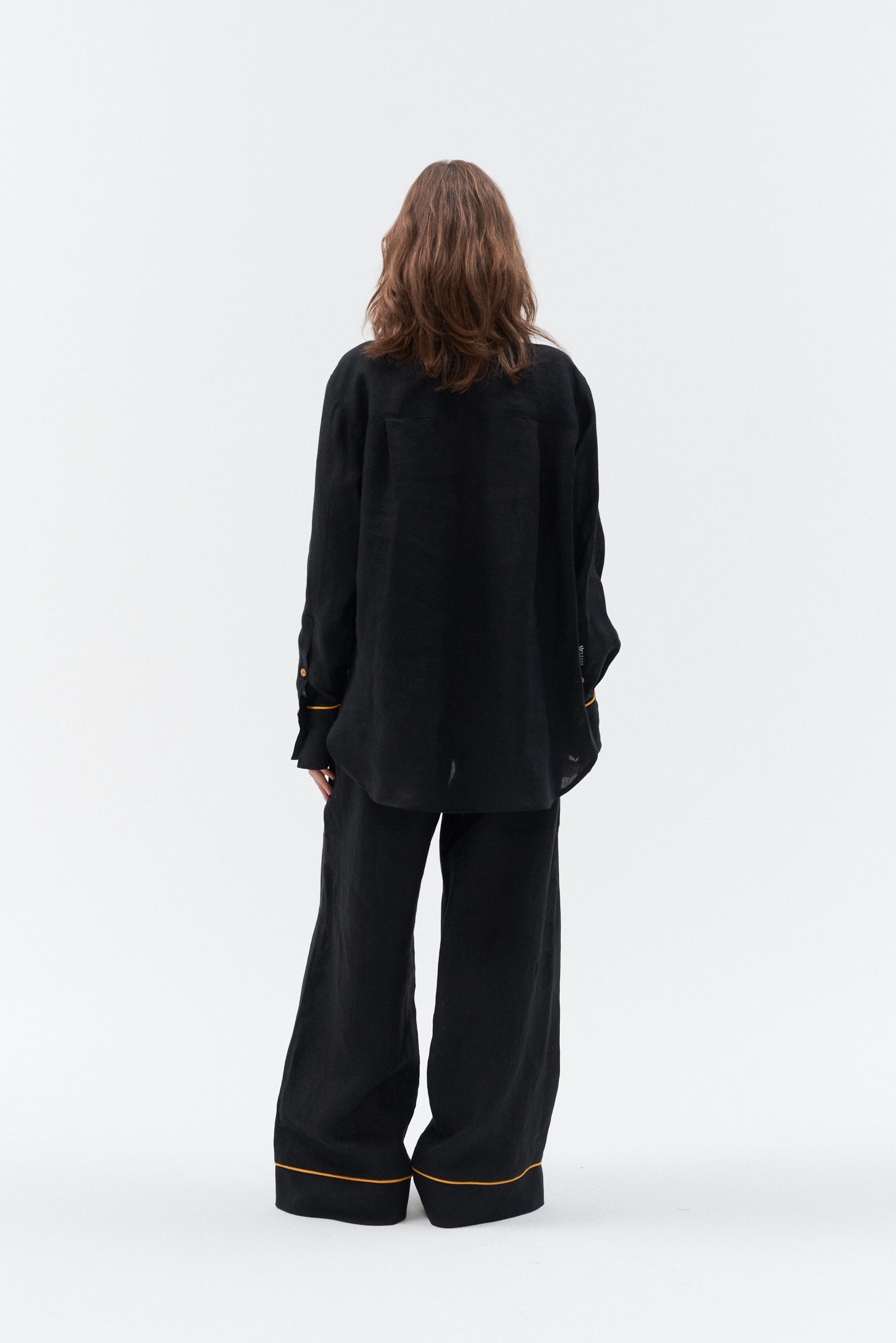 Casual oversized linen shirt styled with wide leg linen trousers