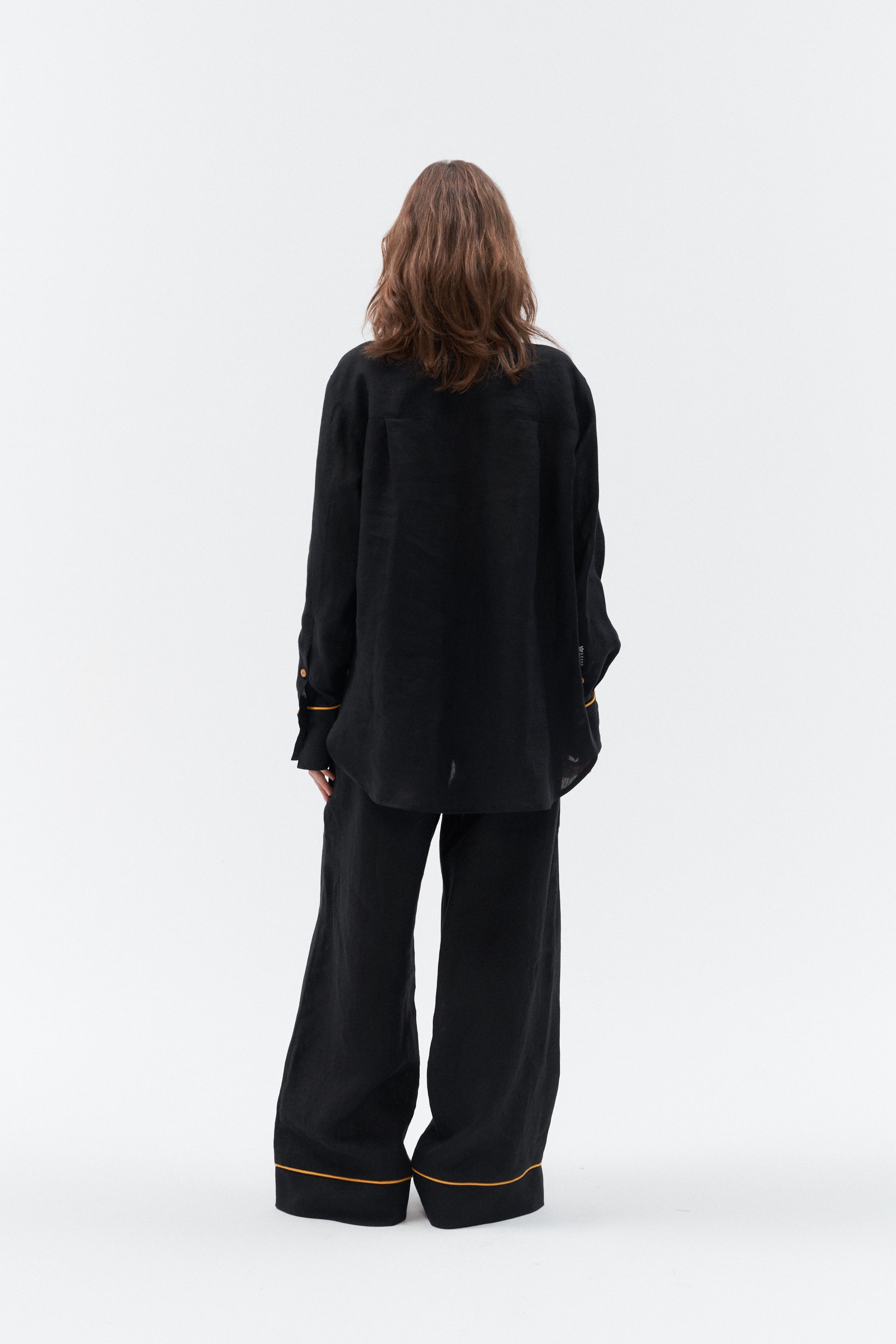 Casual oversized linen shirt styled with wide leg linen trousers