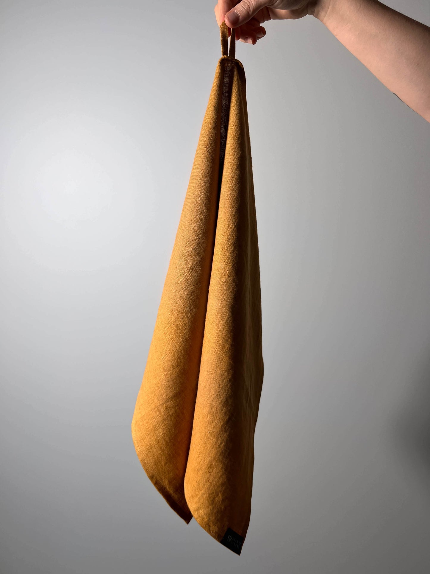 Mustard yellow linen kitchen towel, eco-friendly and absorbent dish towel.