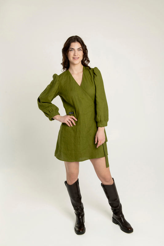 Madeleine crossover linen mini dress with pockets in olive green with adjustable waist.