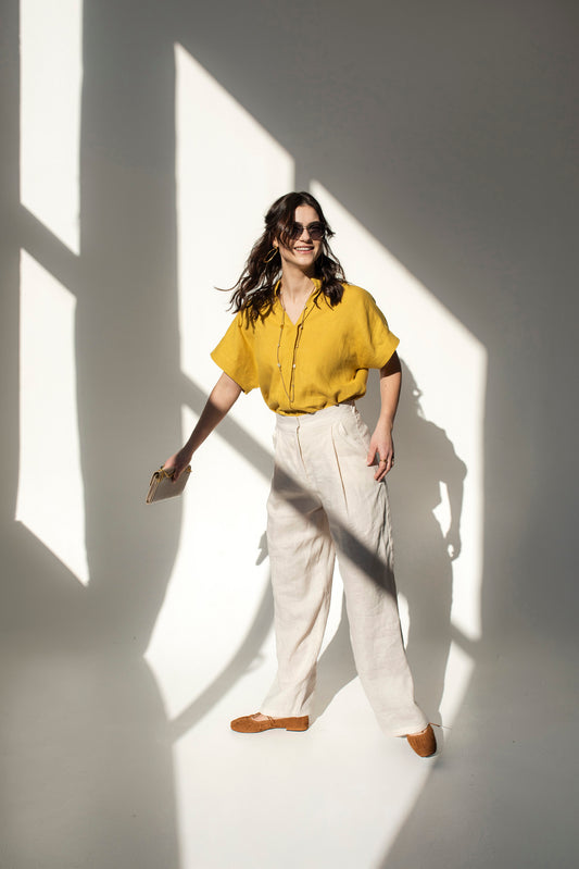 Mustard yellow Japanese style linen top for women with V-neck collar.