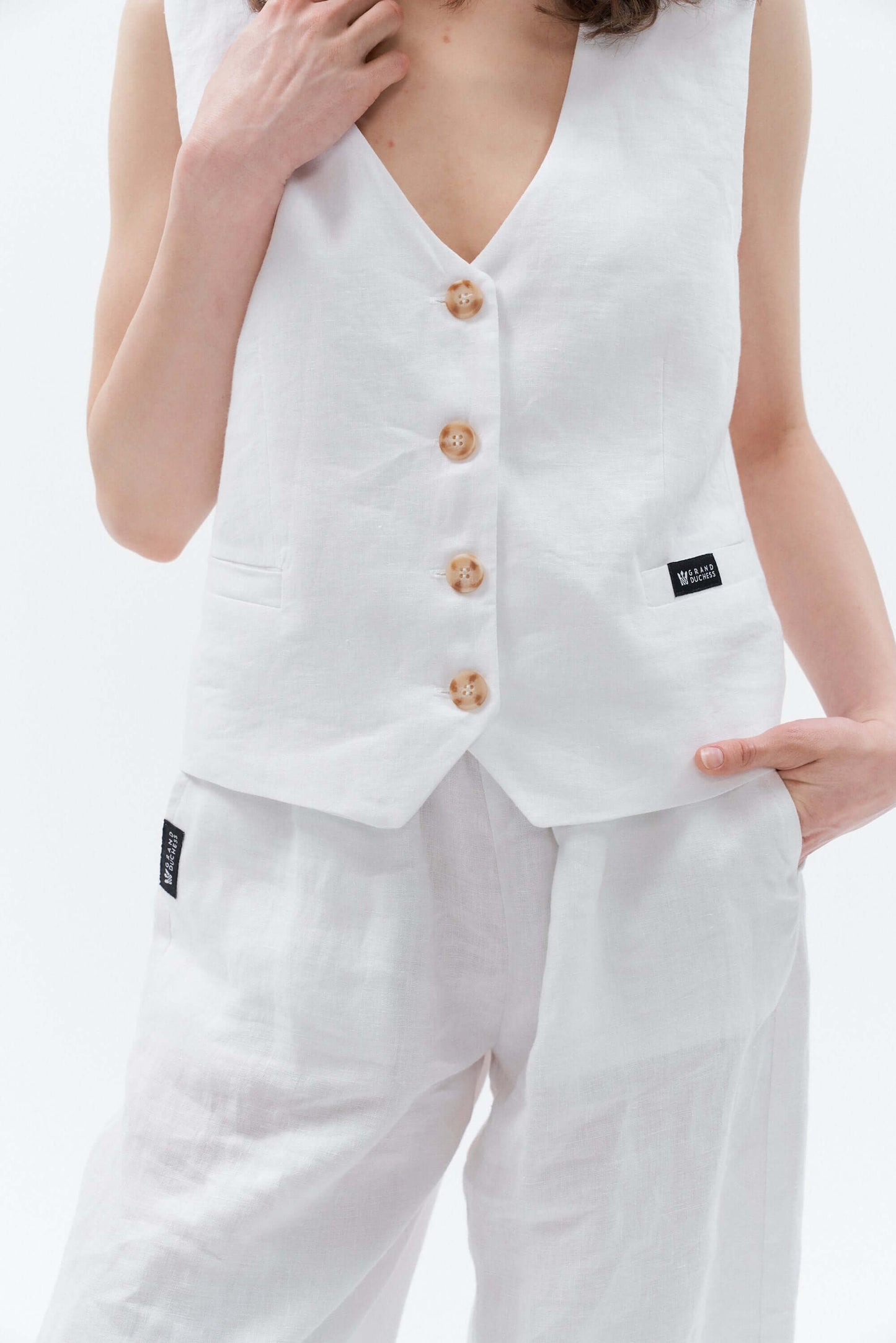 Sleeveless white women's linen waistcoat Vesta.