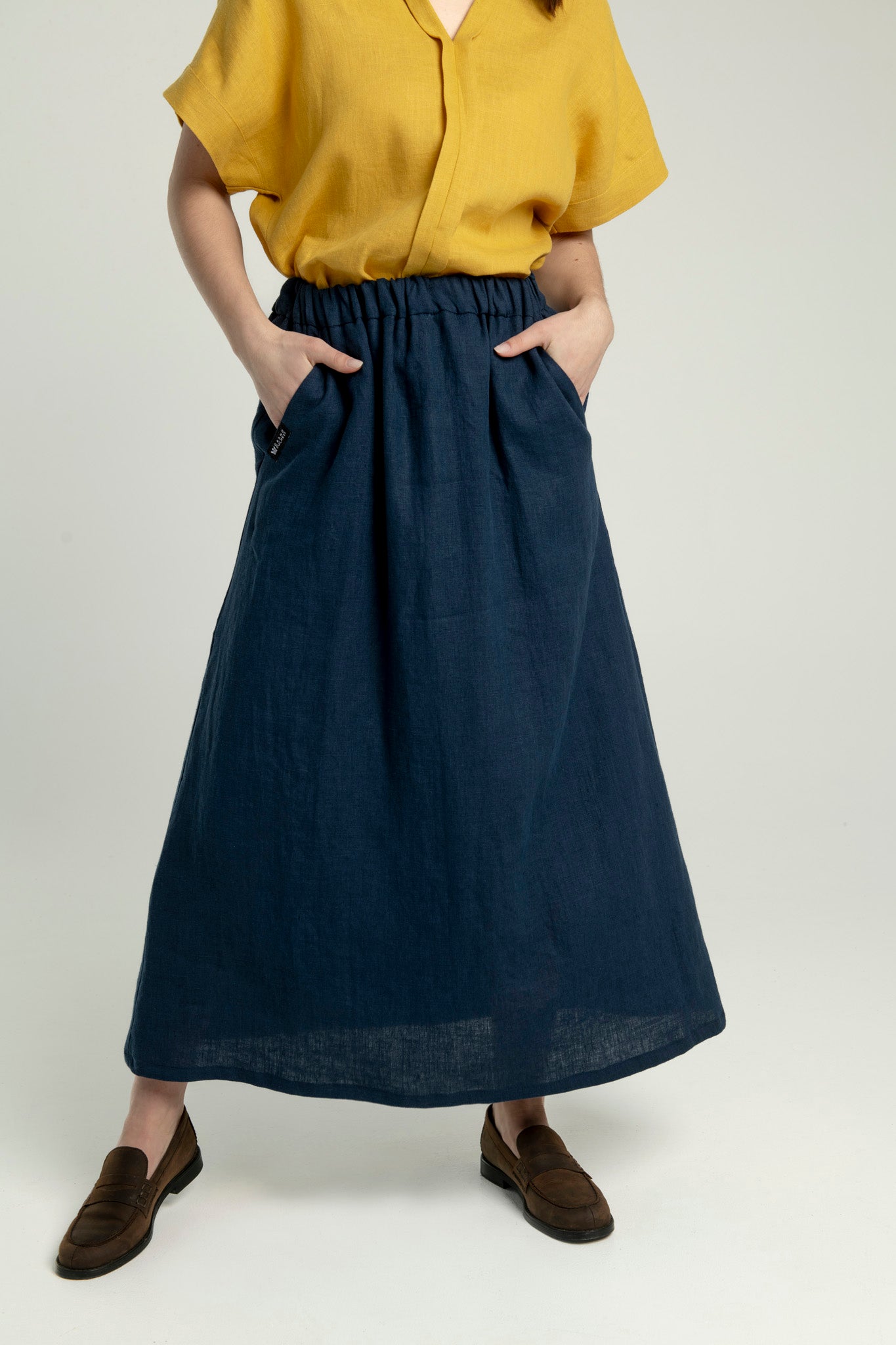 Close-up of pocket detail on Soho linen maxi skirt with pockets.
