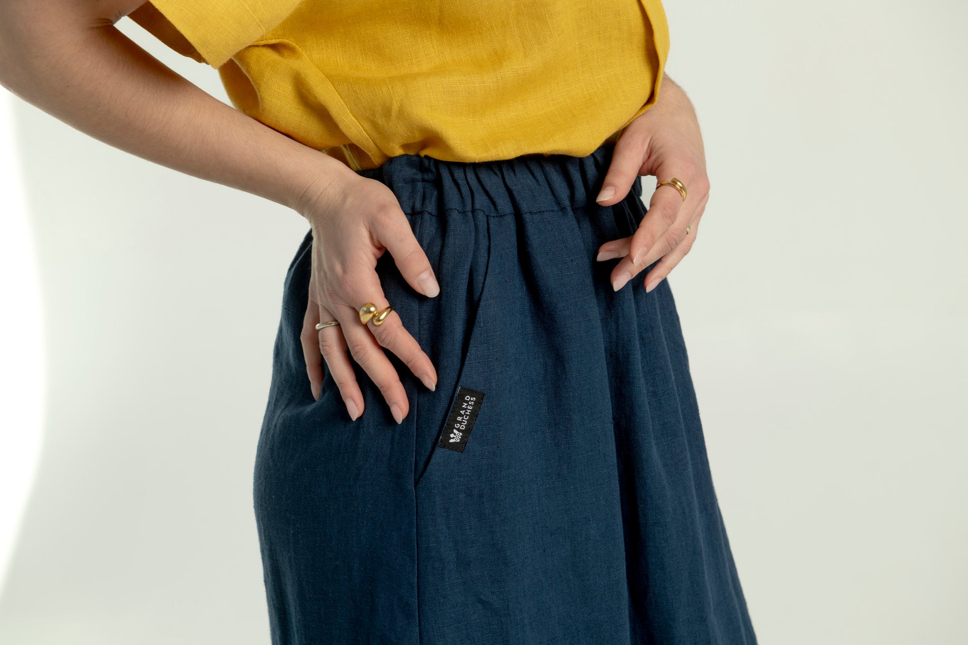 Close-up of elastic waistband and pockets on Soho linen maxi skirt with pockets.