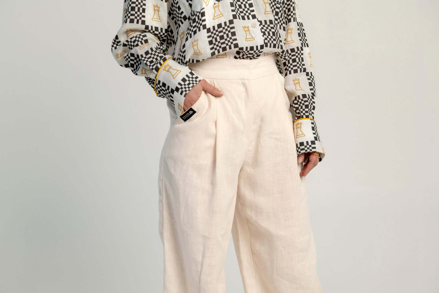 Sustainable beige women's high-waisted linen pants.