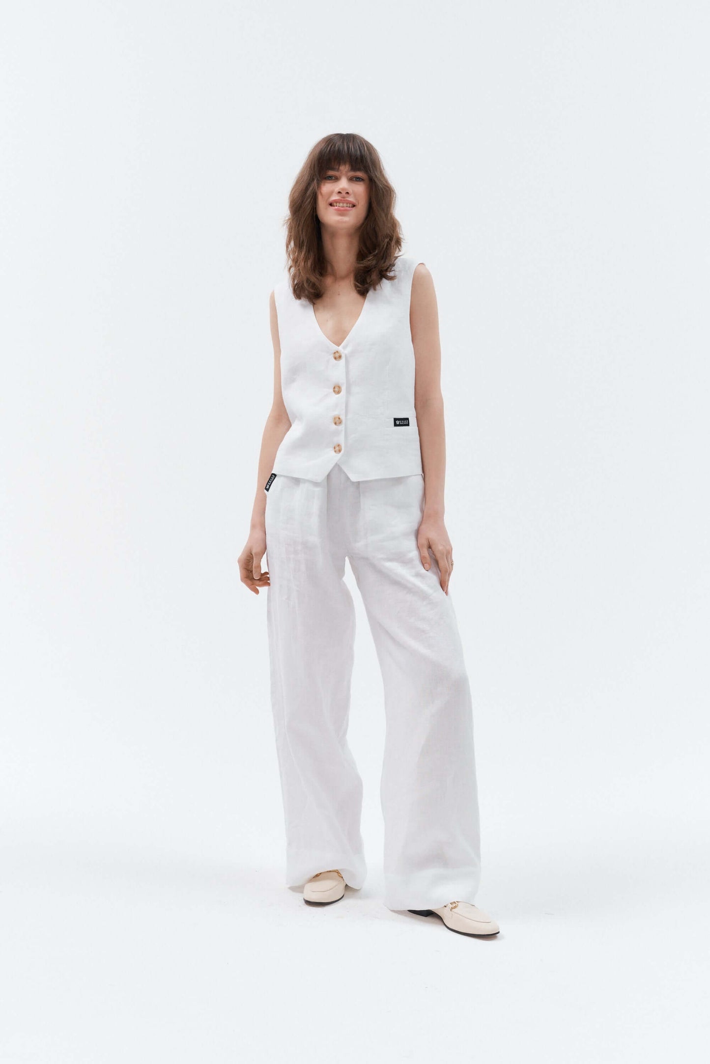 Vesta sleeveless women's linen waistcoat in white.