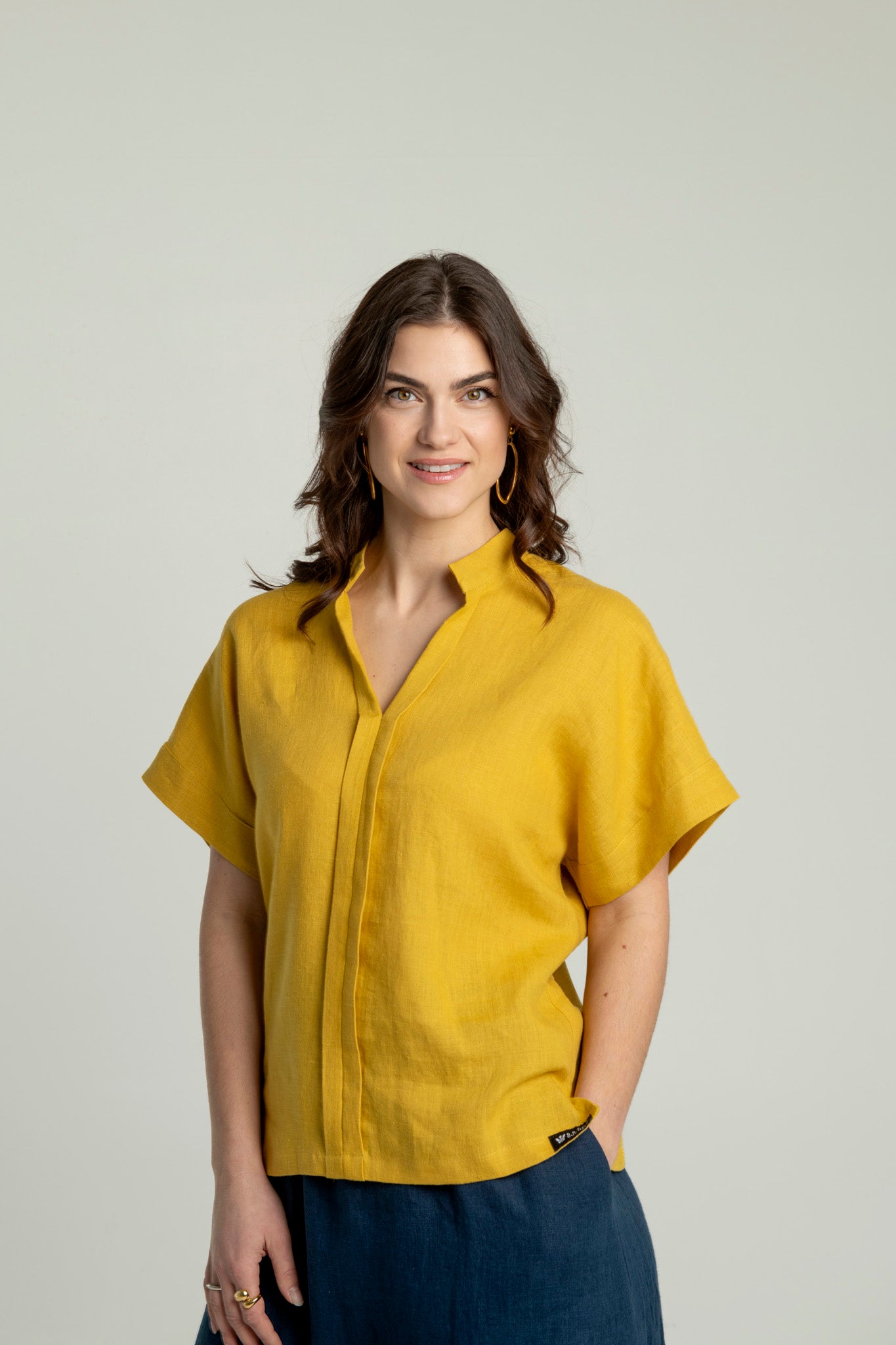 Japanese style linen top in mustard yellow with short sleeves and V-neck collar.