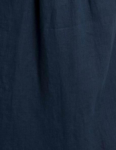 Close-up of navy blue color natural linen fabric, highlighting the texture and breathable quality of women's Japanese style linen top Avenue.