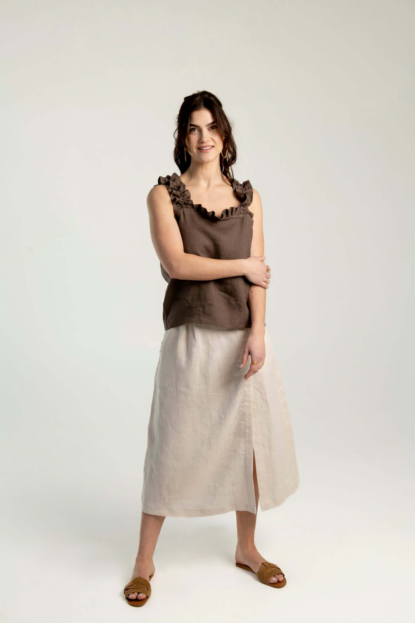 Women's ruffled strap linen top, breathable summer style.