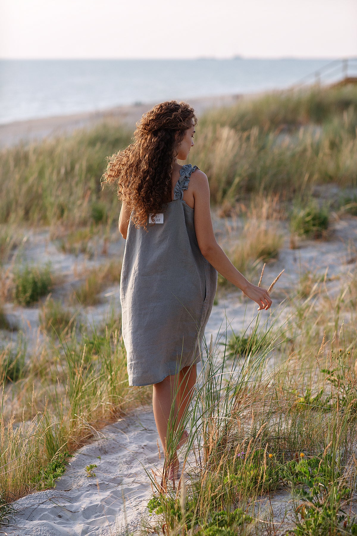 Women’s linen dress Playful – midi style with straps and ruffles